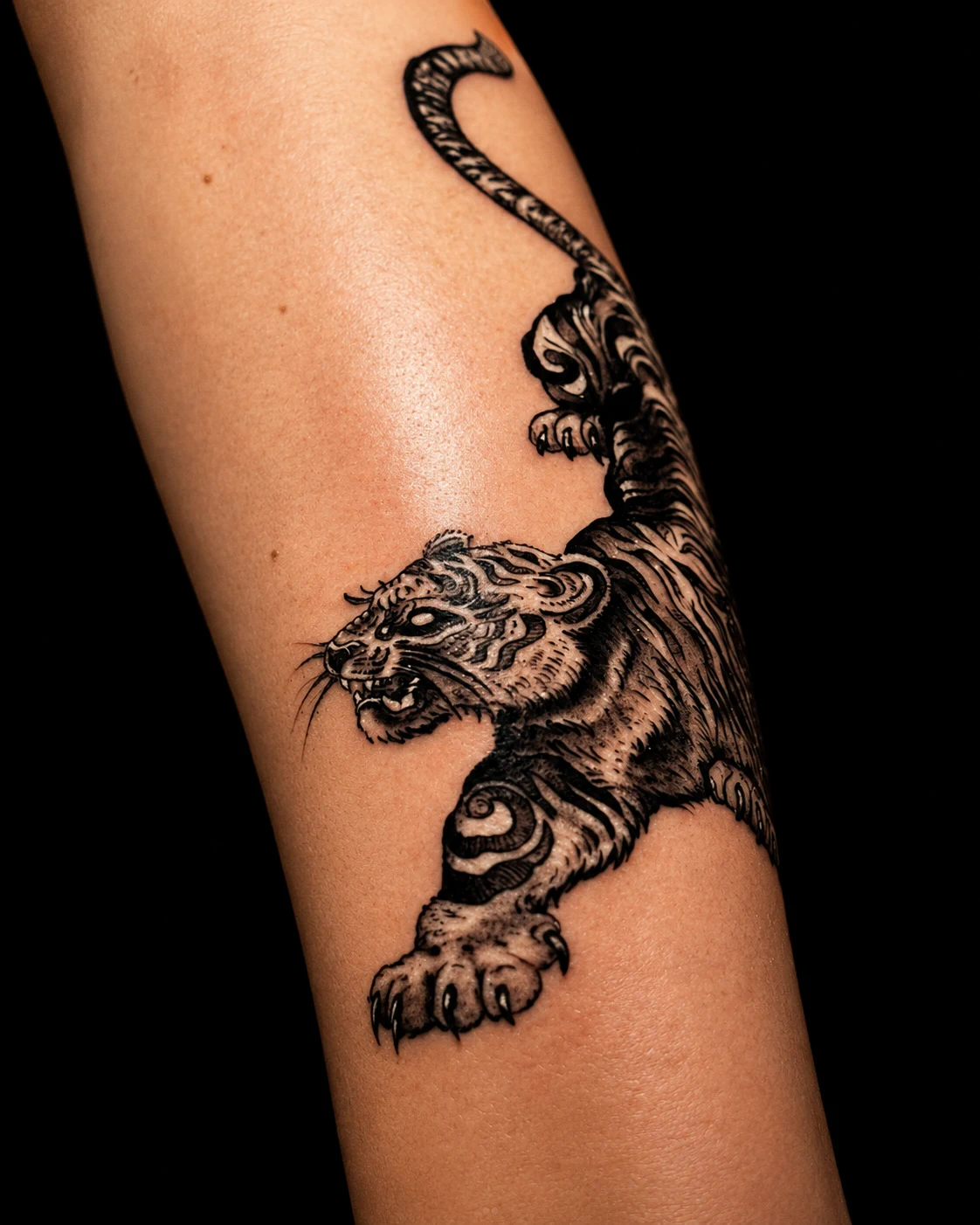 Black and grey tiger tattoo