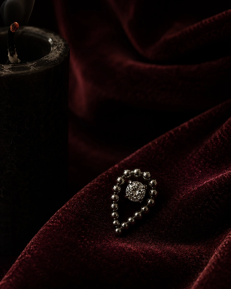 Oxblood teardrop piercing jewelry