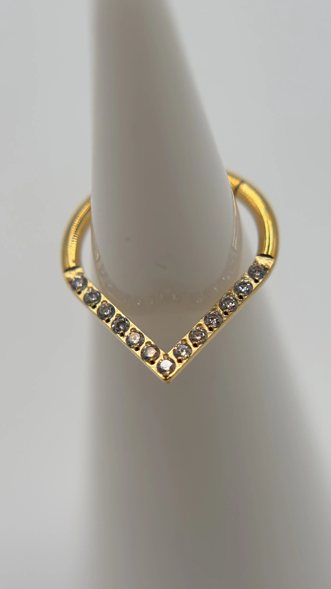 Gold chevron jewelry with crystal details