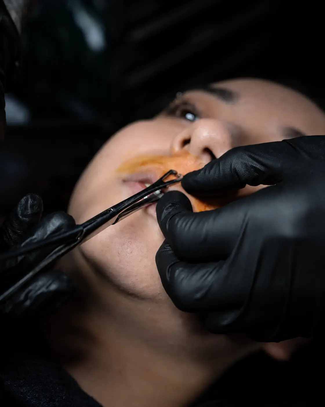 Professional piercing procedure at Endless Ink