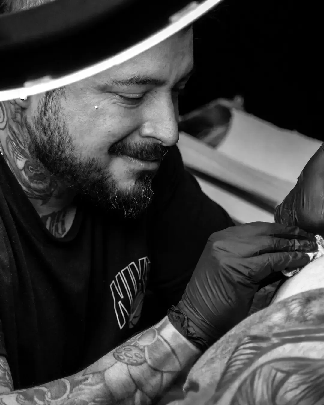 Close-up of an Endless Ink artist at work