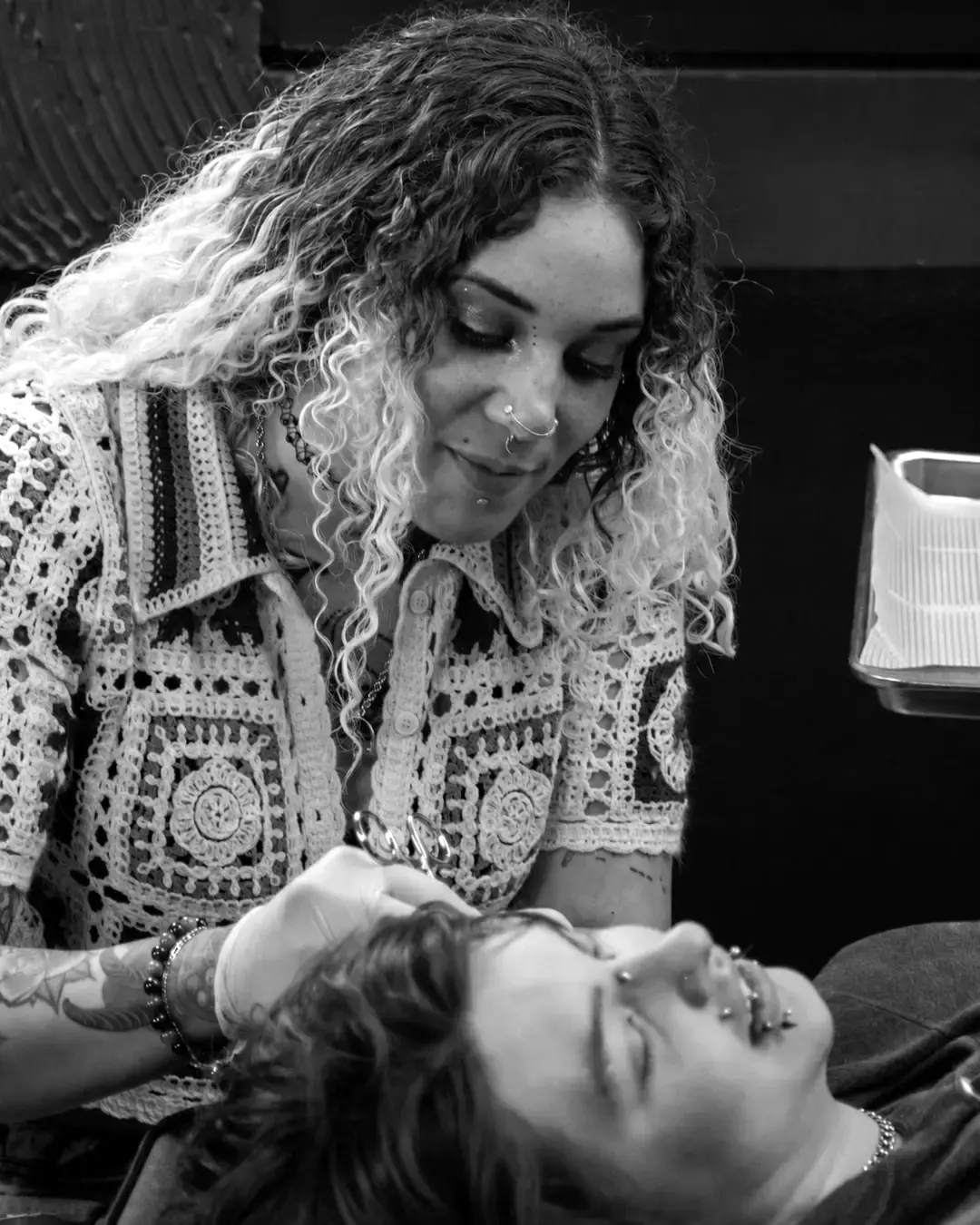 Piercer working with a client at Endless Ink