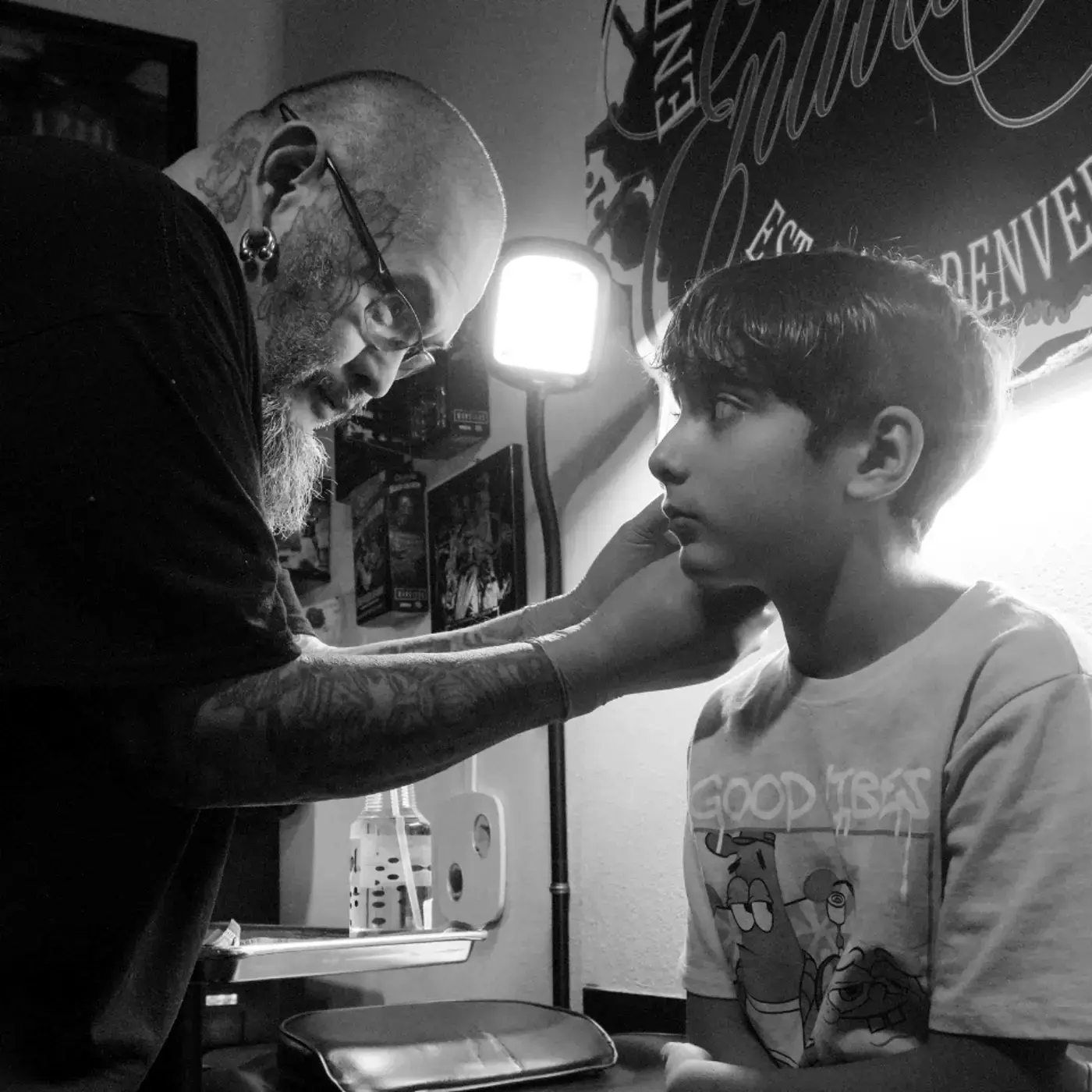 Artist consulting with a client in the studio